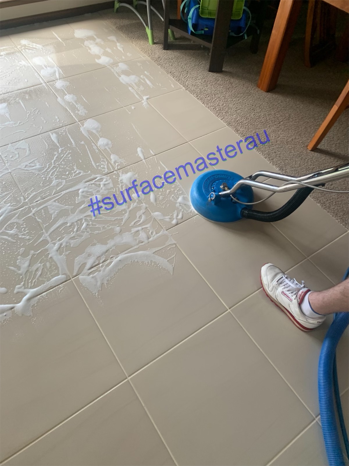 Tile cleaning in progress