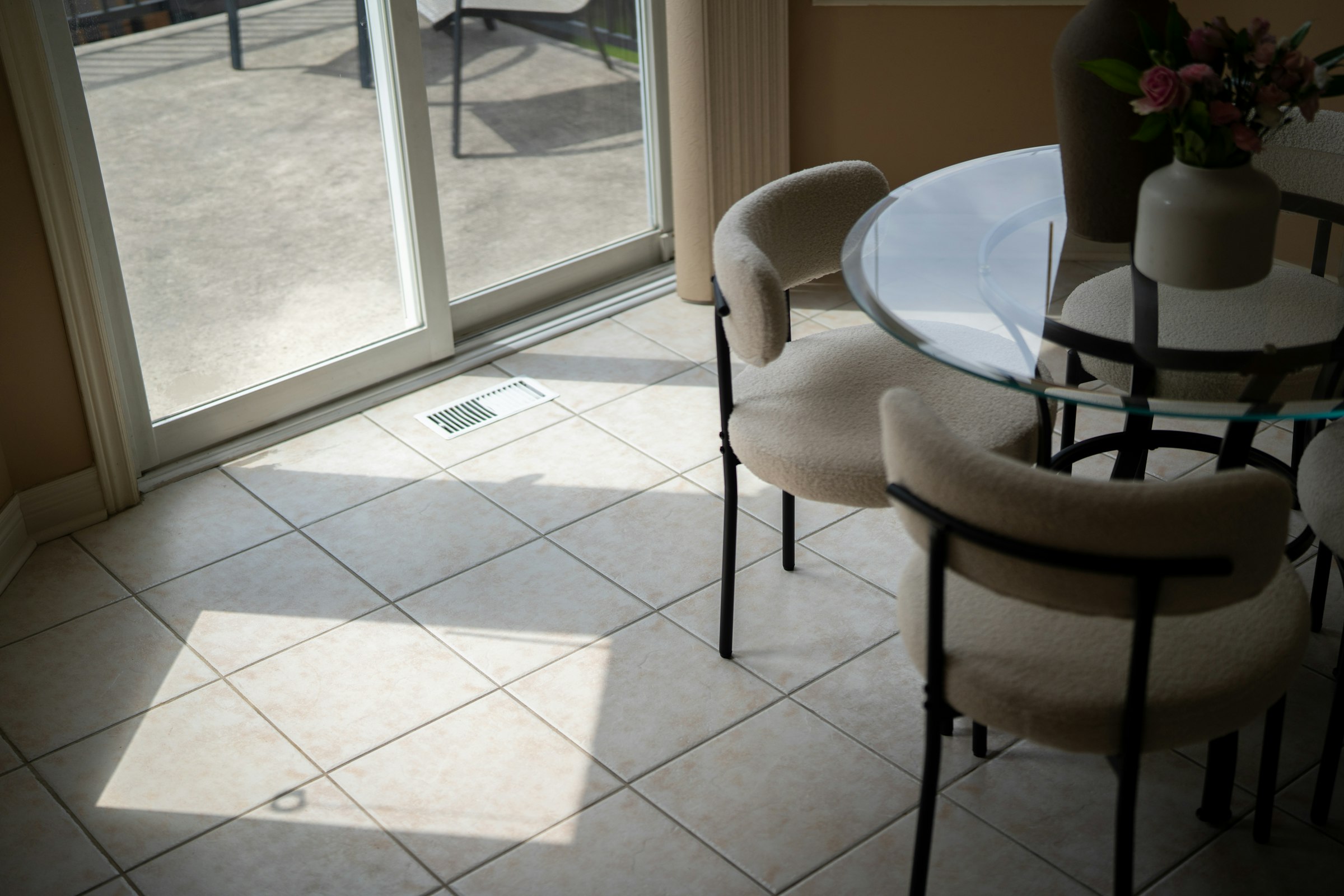Tiled dining area before and after a deep clean